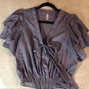 Free people body suit size xs.